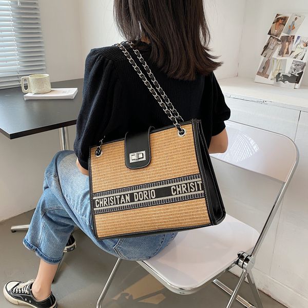 design bag woven 2021 summer high-capacity single shoulder messenger straw woven chain tote bag
design bag woven 2021 summer high-capacity single shoulder messenger straw woven chain tote bag