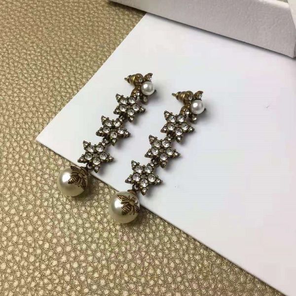design jewelry pearl bee five pointed star water drill 2021 brass 925 silver needle earrings
design jewelry pearl bee five pointed star water drill 2021 brass 925 silver needle earrings