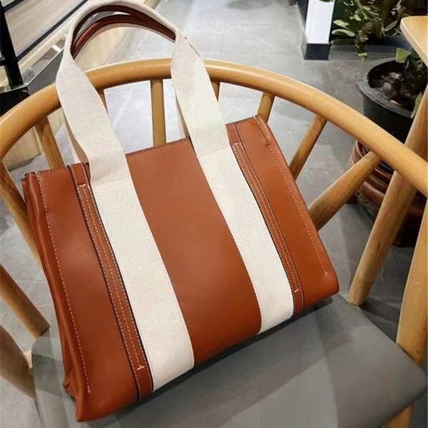 newarrivals designer woody tote women's handbag luxury shoulder bags 34cm/36cm large capacity brand shopping bag 712161, Red;black
newarrivals designer woody tote women's handbag luxury shoulder bags 34cm/36cm large capacity brand shopping bag 712161, Red;black