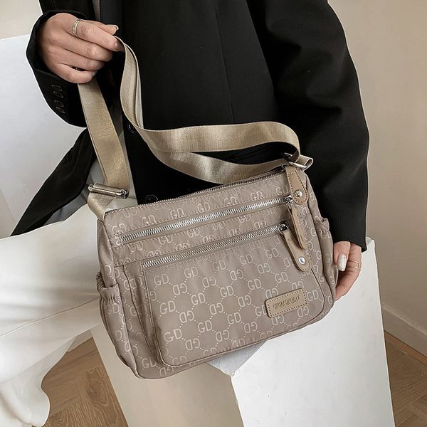 single shoulder bag female new oxford cloth shoulder messenger bag simple portable letter mother's storage purse outlet
single shoulder bag female new oxford cloth shoulder messenger bag simple portable letter mother's storage purse outlet