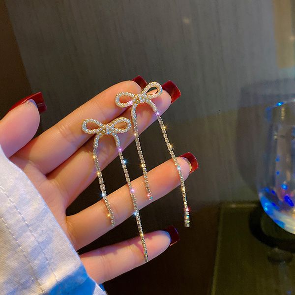 925 silver needle bow long tassel inlaid diamond pearl earrings temperament ear jewelry fashion personality earrings, Golden;silver
925 silver needle bow long tassel inlaid diamond pearl earrings temperament ear jewelry fashion personality earrings, Golden;silver