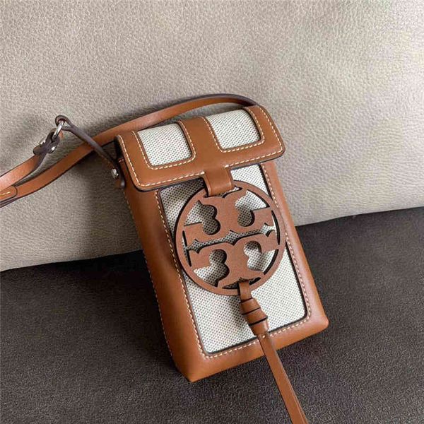 tb new miller mobile phone canvas collage leather one shoulder messenger women's bag
tb new miller mobile phone canvas collage leather one shoulder messenger women's bag