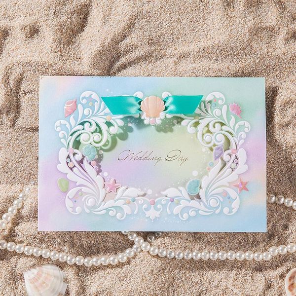 greeting cards laser cut beach themed blue color wedding invitation card with ribbon
greeting cards laser cut beach themed blue color wedding invitation card with ribbon