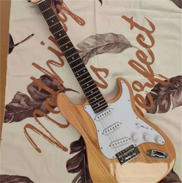 log color six string electric guitar, including mail home, our shop can customize various styles of electric guitar guitars guitarra
log color six string electric guitar, including mail home, our shop can customize various styles of electric guitar guitars guitarra