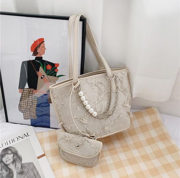 pearl chain portable picture and mother bags 2021 simple fashion trend shoulder bag 
pearl chain portable picture and mother bags 2021 simple fashion trend shoulder bag
