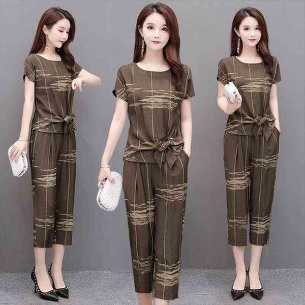 summer fashion elegant suit womenpant short sleeve high waist seven points pants printing two pieces set 4xl y688, White
summer fashion elegant suit womenpant short sleeve high waist seven points pants printing two pieces set 4xl y688, White