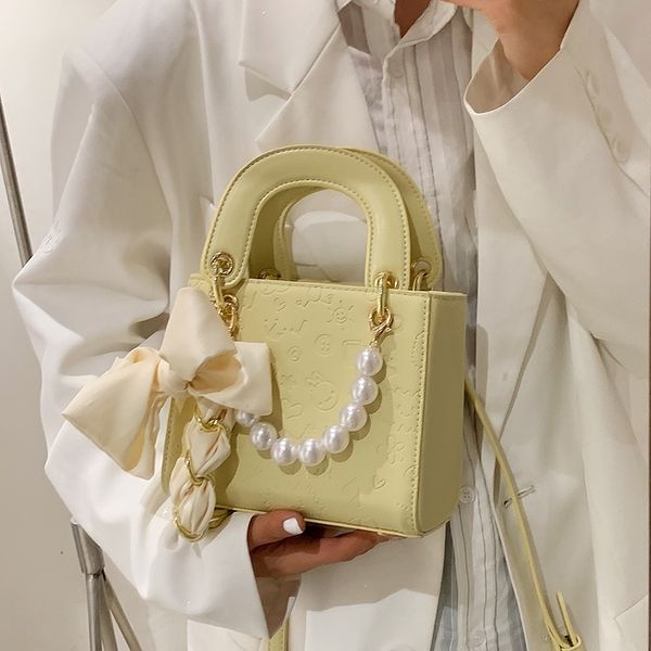 fashion small bag women's handbags summer new handbag portable small square advanced sense foreign style one shoulder messenger princes
fashion small bag women's handbags summer new handbag portable small square advanced sense foreign style one shoulder messenger princes
