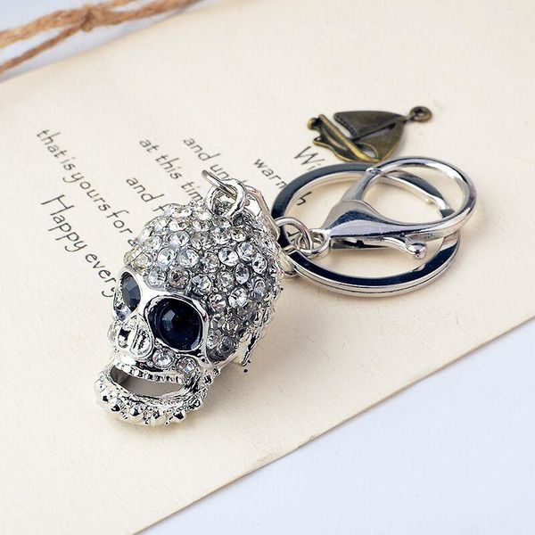 keychains car crystal skull exquisite creative key button men and women's general metal chain for cadillac ct6 xt5 ats-l xts srx cts, Silver
keychains car crystal skull exquisite creative key button men and women's general metal chain for cadillac ct6 xt5 ats-l xts srx cts, Silver