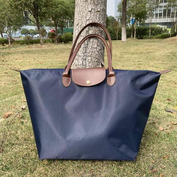 shopping bags nylon travel portable folding light weight waterproof sports skin bag storage backpack 
shopping bags nylon travel portable folding light weight waterproof sports skin bag storage backpack