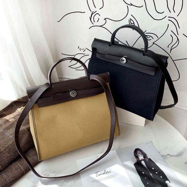 wholesale temperament of bag foreign canvas herbag advanced sense luxurys designers bag
wholesale temperament of bag foreign canvas herbag advanced sense luxurys designers bag