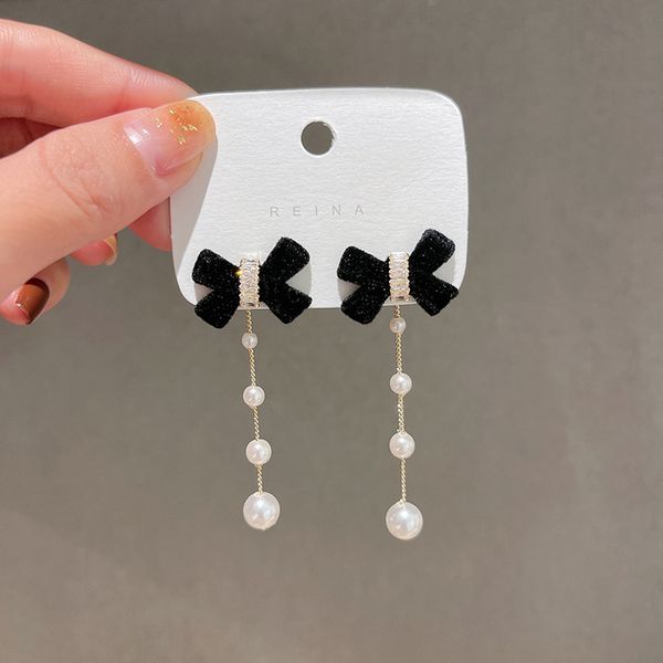 tassel long red velvet bowknot pearl charm female autumn and winter new trendy temperament two-wear silver needle earrings, Golden
tassel long red velvet bowknot pearl charm female autumn and winter new trendy temperament two-wear silver needle earrings, Golden
