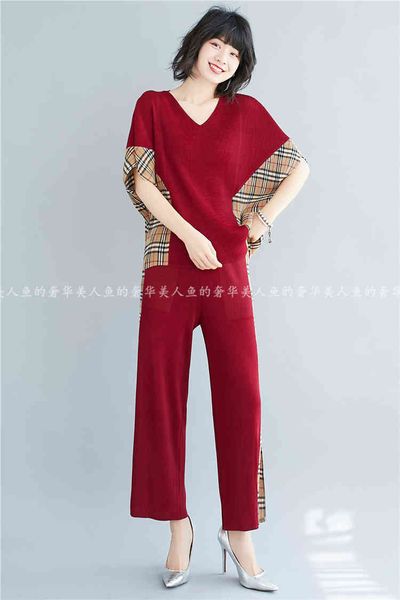 dresses miyake bat sleeve round collar fold loose t-shirts and wide leg pants patchwork gridsuit suit, White
dresses miyake bat sleeve round collar fold loose t-shirts and wide leg pants patchwork gridsuit suit, White