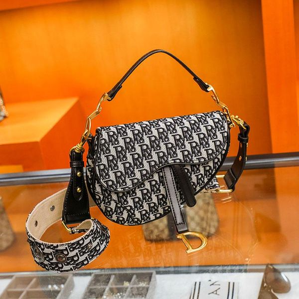 evening bags fashion designer european and american style one shoulder portable straddle bag rivet canvas saddle horseshoe retro
evening bags fashion designer european and american style one shoulder portable straddle bag rivet canvas saddle horseshoe retro
