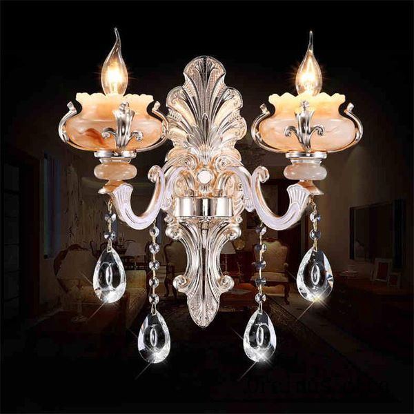 wall lamp simple european style bedroom bed room stairs crystal tv background zinc alloy single double candle 
wall lamp simple european style bedroom bed room stairs crystal tv background zinc alloy single double candle
