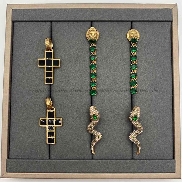 design jewelry new diamond inlaid show earrings double lion head cross earrings, Golden
design jewelry new diamond inlaid show earrings double lion head cross earrings, Golden