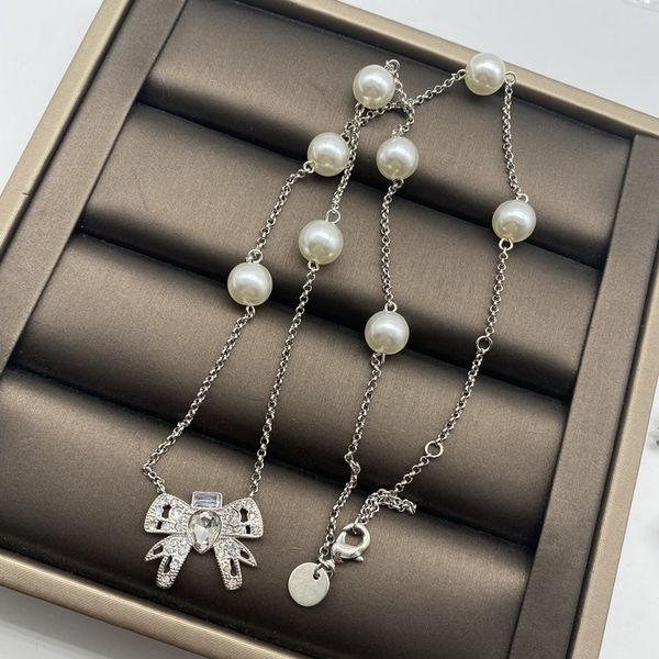 designer's miu's diamond studded bowknot pearl tassel long style celebrity temperament earring hairpin necklace bracelet set, Golden
designer's miu's diamond studded bowknot pearl tassel long style celebrity temperament earring hairpin necklace bracelet set, Golden