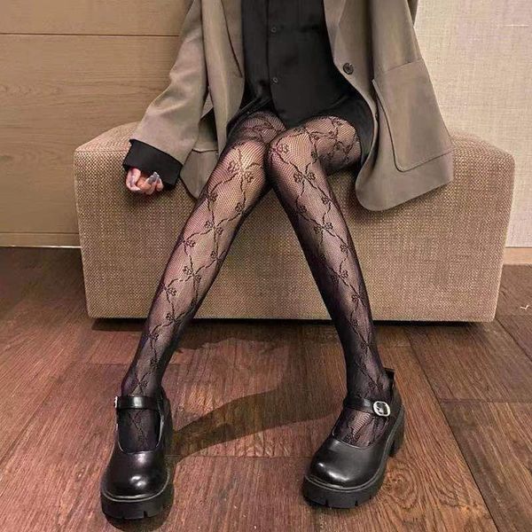 butterfly spring and summer jk black silk bow hollow bottomed thin white fishing net stockings, Black;white
butterfly spring and summer jk black silk bow hollow bottomed thin white fishing net stockings, Black;white