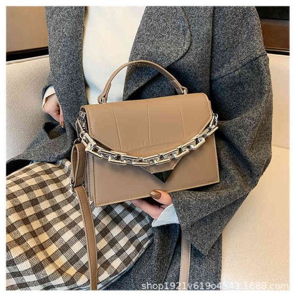 spring 2021 and women summer small square foreign style chain women's messenger bag triangle cover handbag
spring 2021 and women summer small square foreign style chain women's messenger bag triangle cover handbag