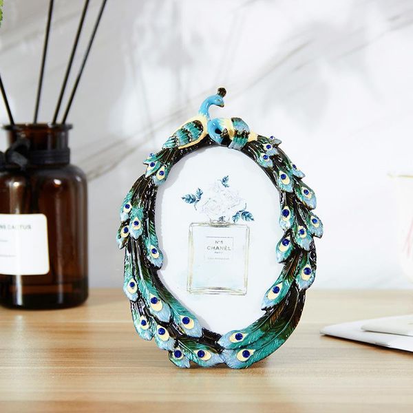 frames and mouldings oval small po frame, hand-studded festive auspicious peacock wedding gift
frames and mouldings oval small po frame, hand-studded festive auspicious peacock wedding gift
