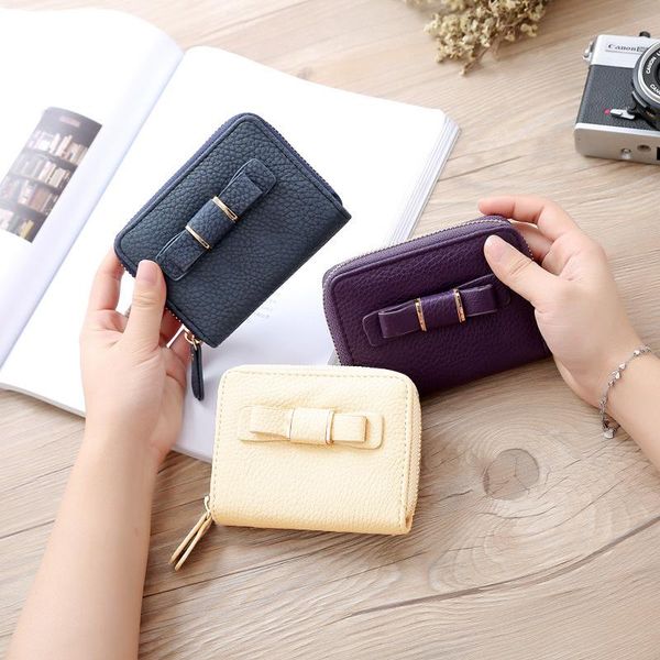 purse women short wallets pure korean simple zipper lady's bow fresh zero lychee leather handbag, White
purse women short wallets pure korean simple zipper lady's bow fresh zero lychee leather handbag, White