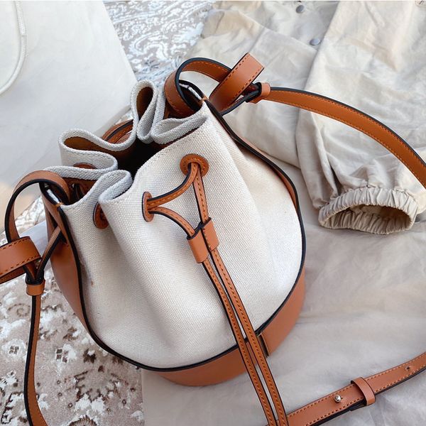 outlet factory canvas leather bucket women's bag splicing style large capacity single shoulder portable messenger luxuryss designerss y
outlet factory canvas leather bucket women's bag splicing style large capacity single shoulder portable messenger luxuryss designerss y