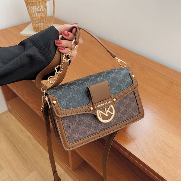 2021 bag female autumn pu small square bag contrast color metal buckle one shoulder trendy messenger simple s
2021 bag female autumn pu small square bag contrast color metal buckle one shoulder trendy messenger simple s