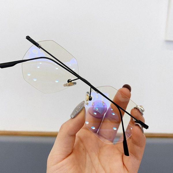 sunglasses vintage ultra light anti-blue glasses rimless optical frame eye protection portable metal eyeglasses computer goggles, White;black
sunglasses vintage ultra light anti-blue glasses rimless optical frame eye protection portable metal eyeglasses computer goggles, White;black