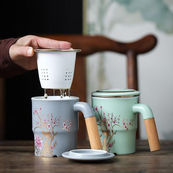 mugs 2021 ceramic tea cups creative design embossed plum blossom water cup with filter cover wooden handle mug
mugs 2021 ceramic tea cups creative design embossed plum blossom water cup with filter cover wooden handle mug