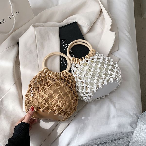 new handbags net red 2021 trendy korean version foreign style personalized wooden hand fashion weaving hollow bucket straw bag factory direc
new handbags net red 2021 trendy korean version foreign style personalized wooden hand fashion weaving hollow bucket straw bag factory direc