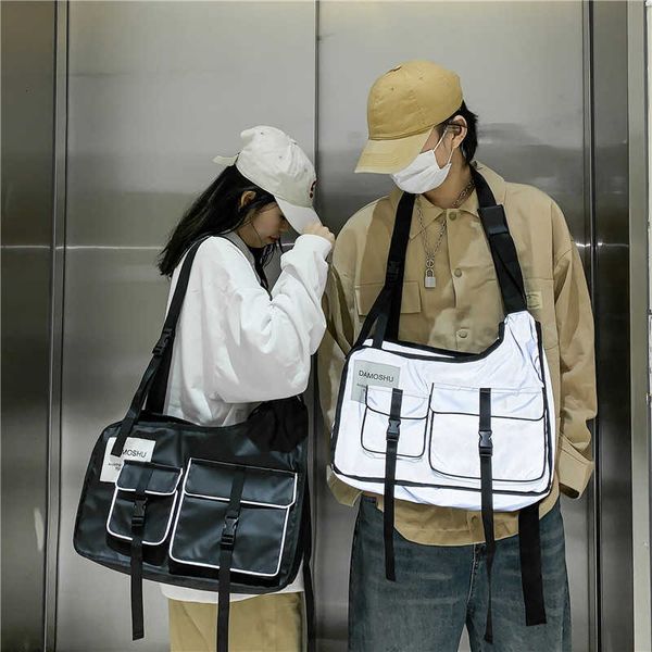 fashion brand ins reflective msenger women's work wear riding shoulder bag men's super fire hip hop student backpack
fashion brand ins reflective msenger women's work wear riding shoulder bag men's super fire hip hop student backpack