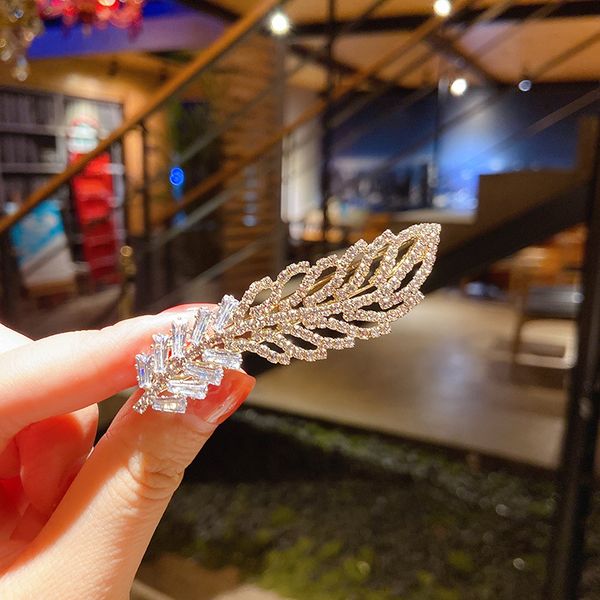 temperament crystal feather hairpin girl fashion bangs clip personality wild go out wash hair accessories, Golden
temperament crystal feather hairpin girl fashion bangs clip personality wild go out wash hair accessories, Golden