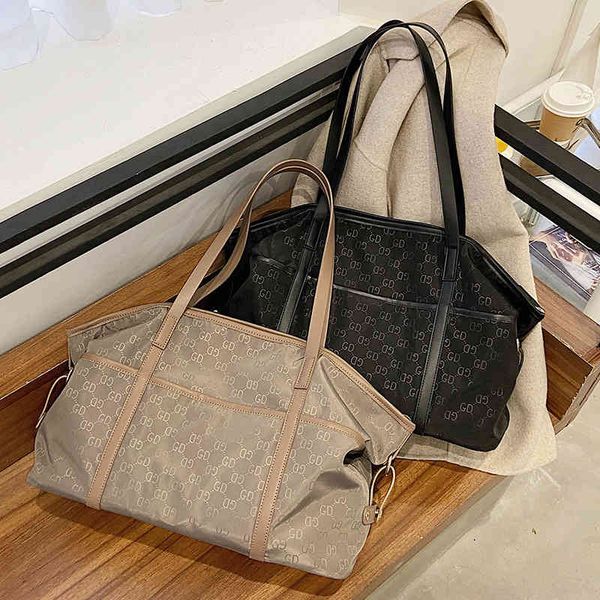 fashion big bag women's new single shoulder large capacity mother's hand simple shopping armpit tote bag
fashion big bag women's new single shoulder large capacity mother's hand simple shopping armpit tote bag