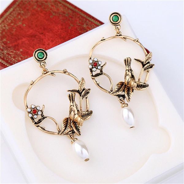 stud bohemian ethnic vintage elegant pearl flower three-dimensional bird earrings fashion simple female charm pendant, Golden;silver
stud bohemian ethnic vintage elegant pearl flower three-dimensional bird earrings fashion simple female charm pendant, Golden;silver