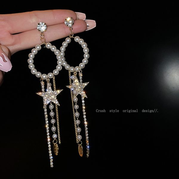 925 silver needle inlaid with diamond pearl circle star net red fashion temperament mystery cool wind earrings
925 silver needle inlaid with diamond pearl circle star net red fashion temperament mystery cool wind earrings