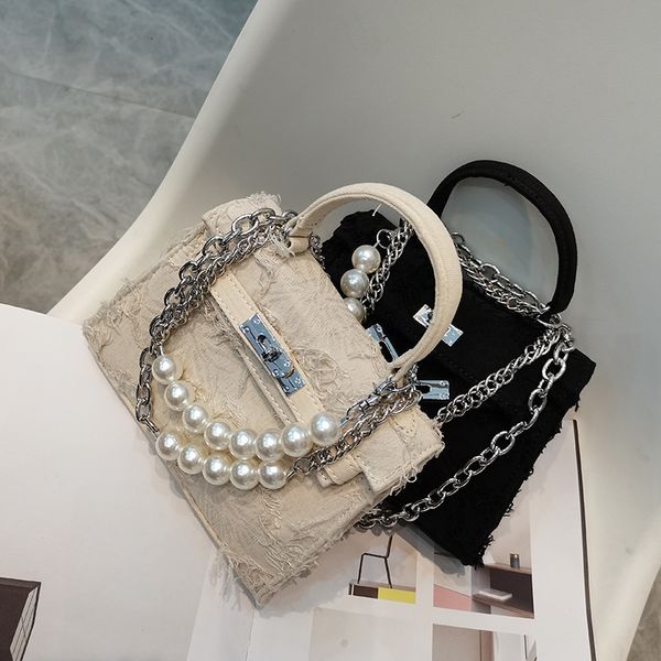 pearl chain spoof kelly bag women's 2021 popular single shoulder canvas ins net red same hand
pearl chain spoof kelly bag women's 2021 popular single shoulder canvas ins net red same hand