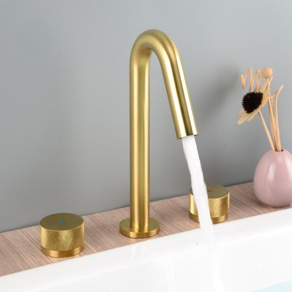 light luxury brushed gold brass bathroom sink faucet copper three holes cold basin mixer tap faucets 
light luxury brushed gold brass bathroom sink faucet copper three holes cold basin mixer tap faucets