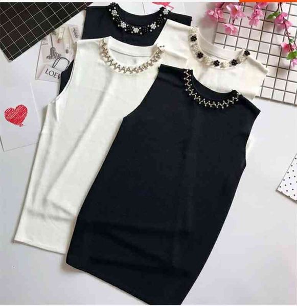 korean summer fashion women sleeveless thin sweater female all-match beading o-neck knitted vest girl camis tank, White;black
korean summer fashion women sleeveless thin sweater female all-match beading o-neck knitted vest girl camis tank, White;black