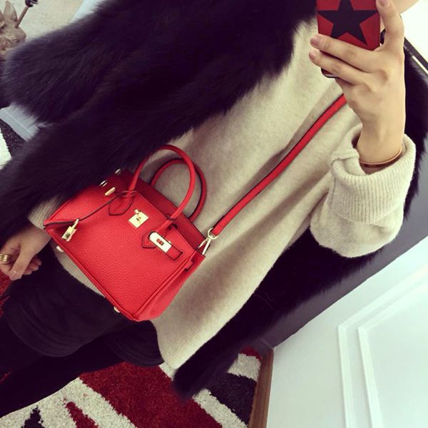 lychee grain leather fashion women's mini handbag lock kelly one shoulder messenger bag
lychee grain leather fashion women's mini handbag lock kelly one shoulder messenger bag