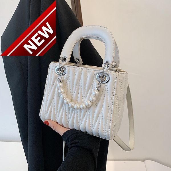 women's 2022 net red new fashion pearl portable princess bag summer one shoulder messenger
women's 2022 net red new fashion pearl portable princess bag summer one shoulder messenger