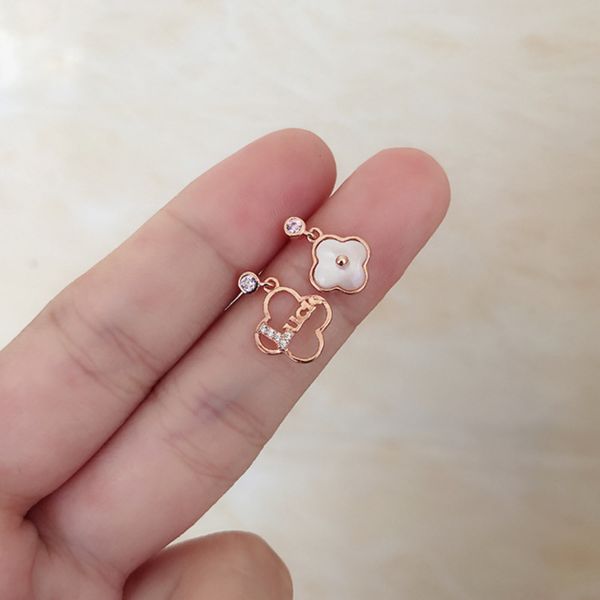925 silver korean style earrings net red hollow asymmetric clover shell lovely temperament earrings, Black
925 silver korean style earrings net red hollow asymmetric clover shell lovely temperament earrings, Black