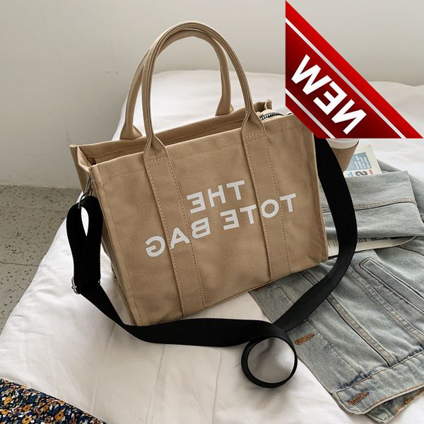 2022 new simple luxury fashionable diagonal literary fan letter printing large-capacity canvas one-shoulder women shopping bag
2022 new simple luxury fashionable diagonal literary fan letter printing large-capacity canvas one-shoulder women shopping bag