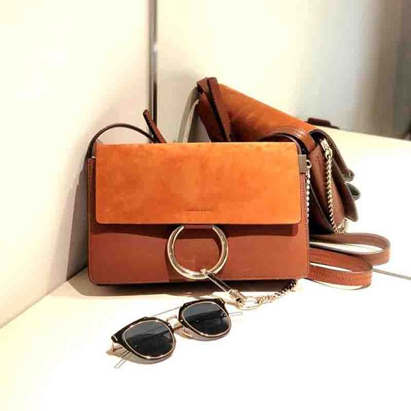 fashion women shoulder bags luxurys lady classic ring chain crossbody small totes designers girl handbags delicate gift
fashion women shoulder bags luxurys lady classic ring chain crossbody small totes designers girl handbags delicate gift