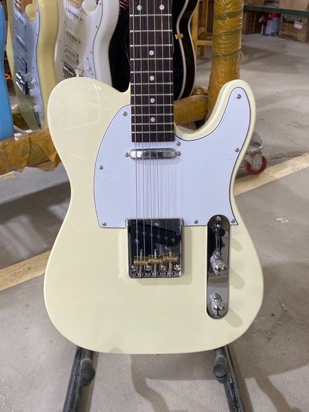 electric guitar cream yellow color rosewood fingerboard chrome hardware white pickguard high quality
electric guitar cream yellow color rosewood fingerboard chrome hardware white pickguard high quality