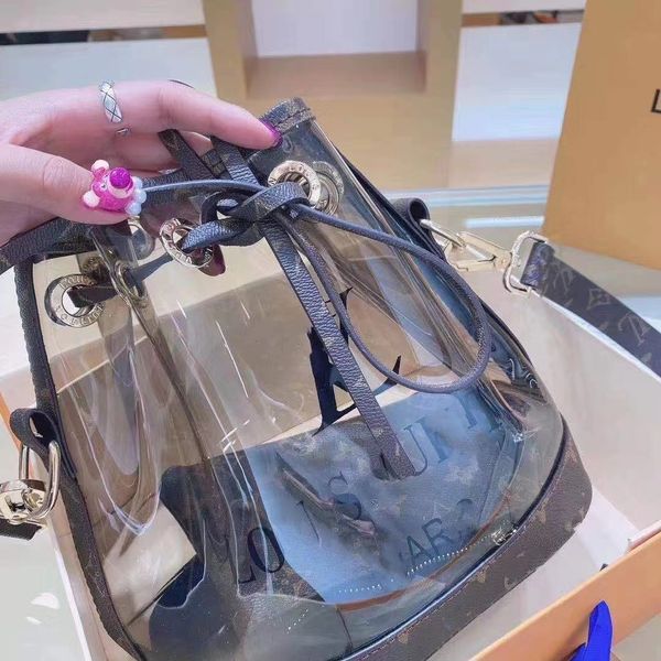 designer bag fashion luxury brand tote with lock shoulder strap transparent clear pvc
designer bag fashion luxury brand tote with lock shoulder strap transparent clear pvc