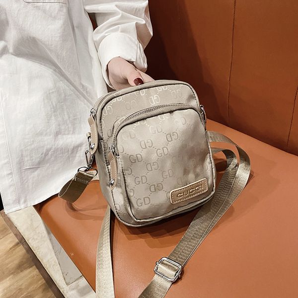 leisure bag women's new light fashion canvas mini mobile phone oxford one shoulder messenger bag
leisure bag women's new light fashion canvas mini mobile phone oxford one shoulder messenger bag