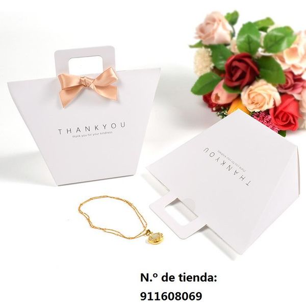 gift wrap box solid color simple hand printing spot portable kraft paper bronzing wedding candy packaging bag
gift wrap box solid color simple hand printing spot portable kraft paper bronzing wedding candy packaging bag