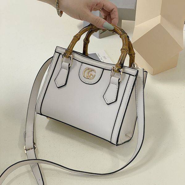 high-quality s ni rong zuer's same mini tote bag diana leisure simple hand women's bag
high-quality s ni rong zuer's same mini tote bag diana leisure simple hand women's bag