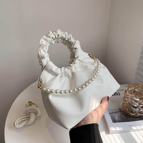 2021 summer women's portable diagonal large capacity dual-purpose fashion korean pearl candy princess diana bag
2021 summer women's portable diagonal large capacity dual-purpose fashion korean pearl candy princess diana bag