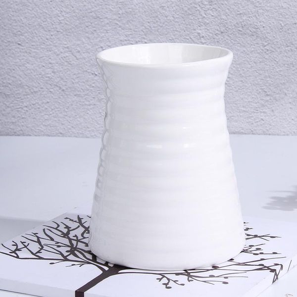 vases classic white ceramic vase modern art and crafts decor contracted porcelain flower creative gift household decoration 
vases classic white ceramic vase modern art and crafts decor contracted porcelain flower creative gift household decoration