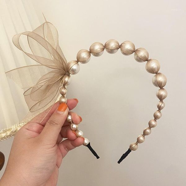 high-quality headband korean female wild anti-skid retro french princess wind covered yarn pearl hair bun maker1, Brown
high-quality headband korean female wild anti-skid retro french princess wind covered yarn pearl hair bun maker1, Brown